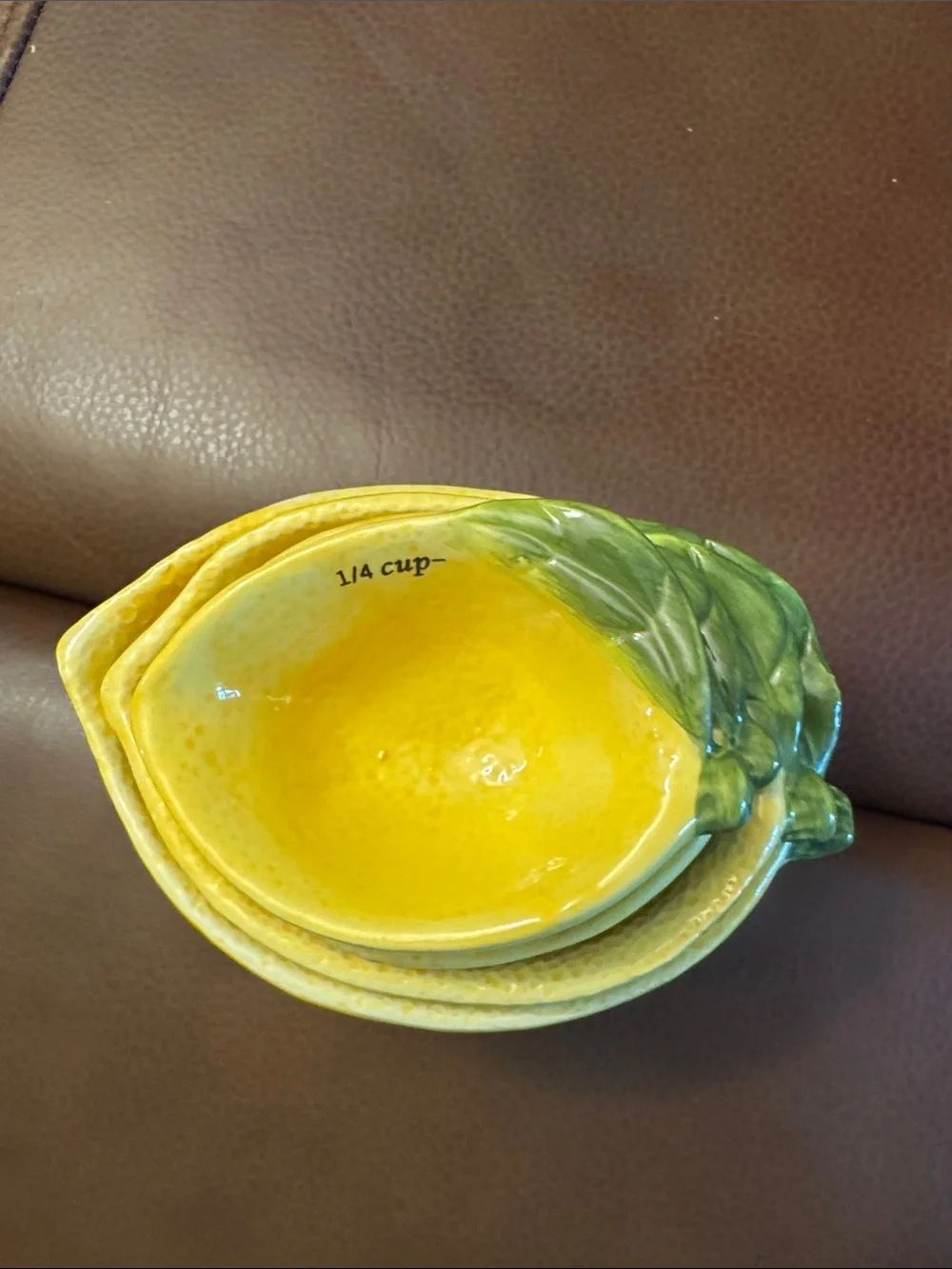 Lemon shaped nesting measuring cups